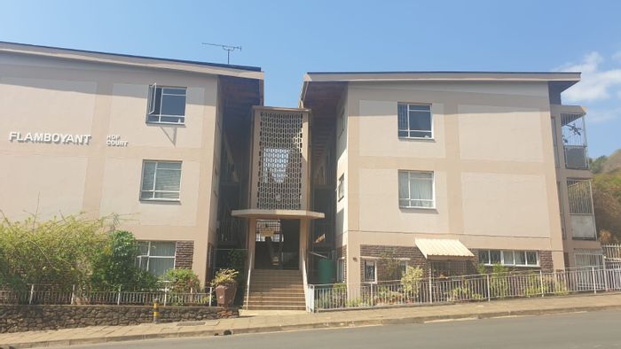 For Sale: Flat in Barberton Central with 1 bedroom, veranda, and covered parking.