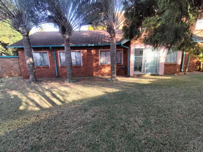 For Sale: Spacious 5-bedroom house in The Orchards with garage and garden sheds.