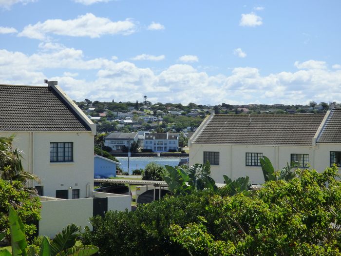 For Sale: West Beach Townhouse with beach access, courtyard, and balcony views.