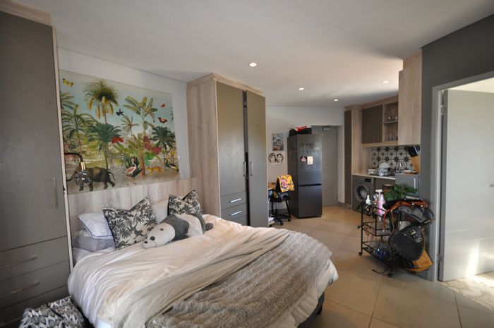 Dennesig Apartment For Sale: Bachelor unit with private patio and pool access.