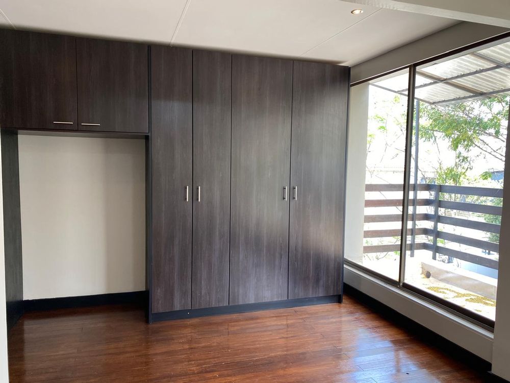 Main bedroom leads onto balcony