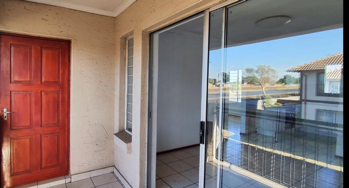 2-Bedroom Apartment For Sale in Parkrand with balcony, security, and parking.