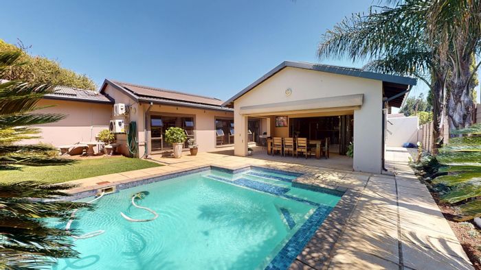Spacious 5-bedroom house in Farrarmere with pool, garages, and office space. For Sale.