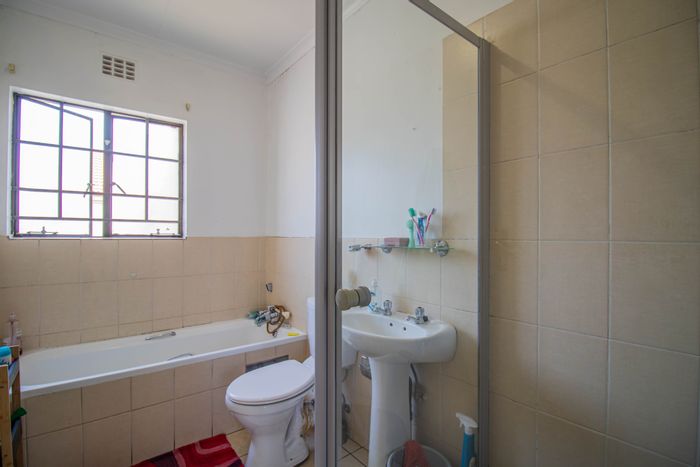 2-Bedroom Apartment For Sale in Grand Central with secure parking and communal amenities.