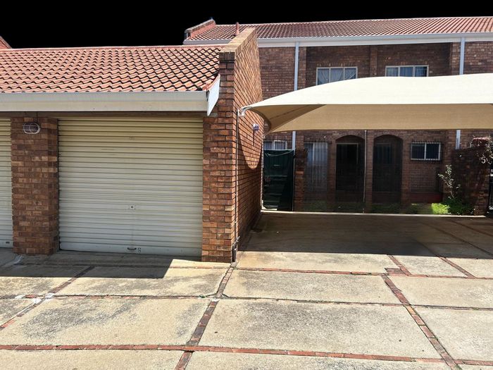 3-Bedroom Townhouse To Rent in Halfway Gardens with private garden and garage.