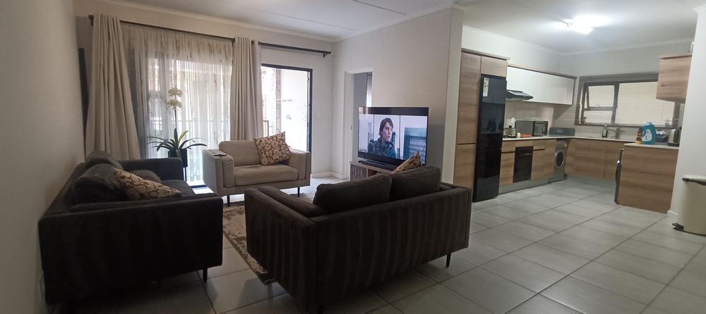 Open Plan Living/Kitchen Area leading out to Balcony