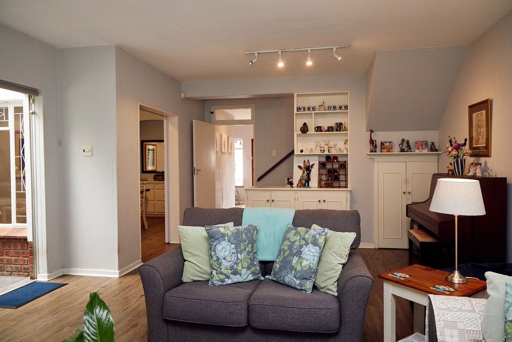 View looking back to dining room and stairwell going upstairs