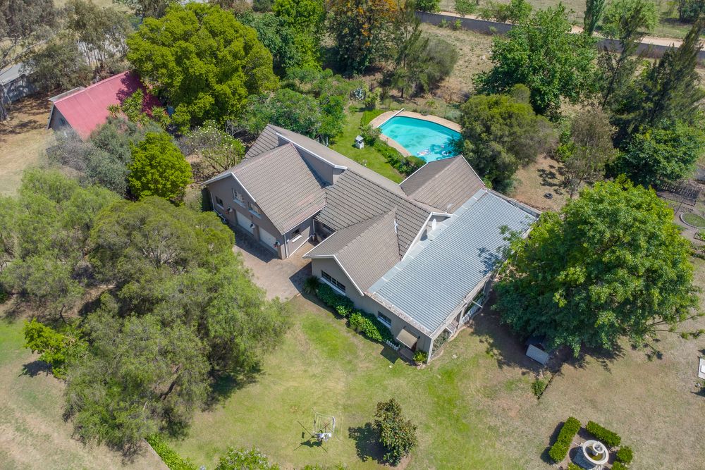 Aerial view of main house and pool