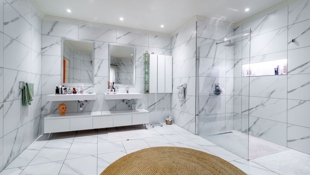 Double vanities, large shower and freestanding bath