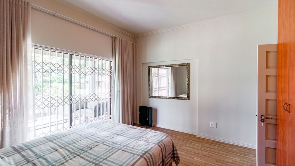 One of the two downstairs bedrooms