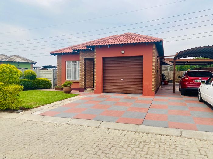 For Sale: House in Waterval East with 3 bedrooms, garage, and carports.