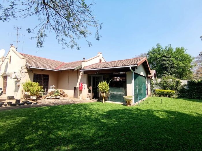 Spacious 3-bedroom townhouse with study, garden, and air conditioning in Protea Park. For Sale.