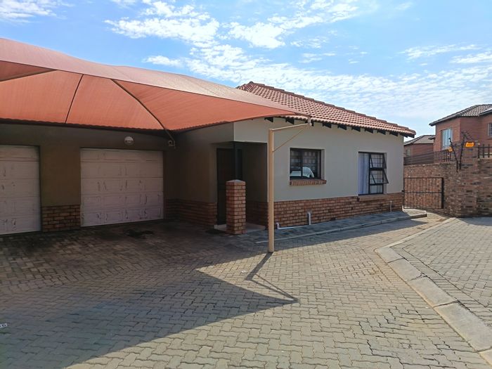 For Sale: 3-Bedroom Townhouse in Waterval East with Pool and Secure Complex Access.
