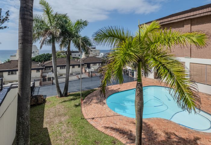Umhlanga Central Apartment For Sale: 2 Bedrooms, Pool, Garage, Income Potential.