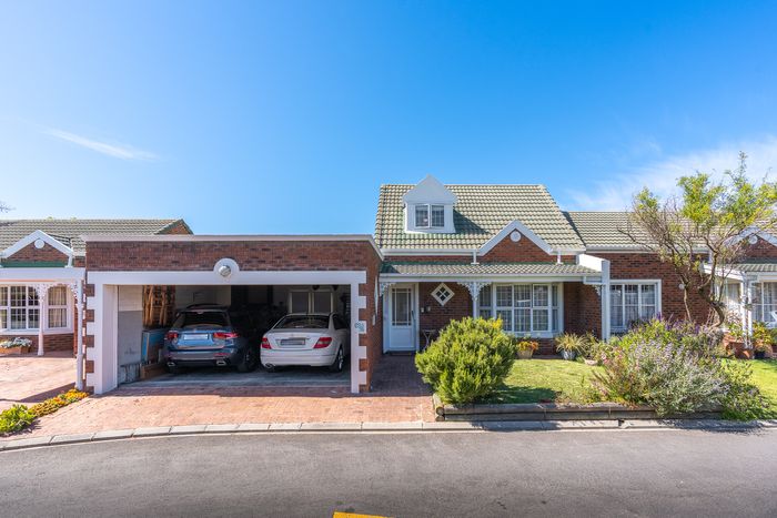 For Sale: House in Pinelands with 3 beds, patio, garage, and security features.