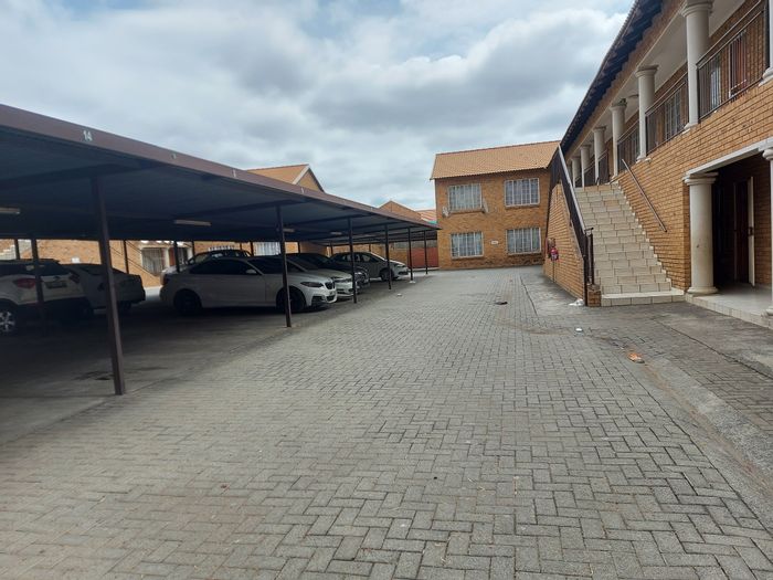 For Sale: 2-Bedroom Apartment in Rustenburg Central, near amenities and secure parking.