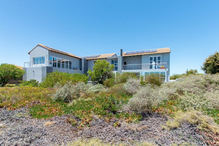 For Sale: House in Langebaan Country Estate with pool, golf views, and energy efficiency.