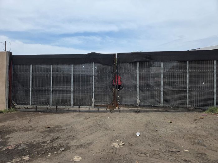 For Sale: House in Clairwood with ample parking, dual access, and office potential.