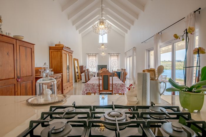 Maremmana Estate House For Sale: Scenic views, spacious layout, private courtyard, and garage.