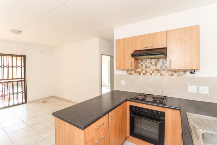 For Sale: 2 Bed, 2 Bath Apartment in Groblerpark with Private Garden and Security.