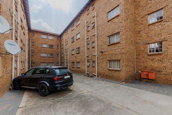 1-Bedroom Apartment For Sale in Randfontein Central with parking and convenient amenities.