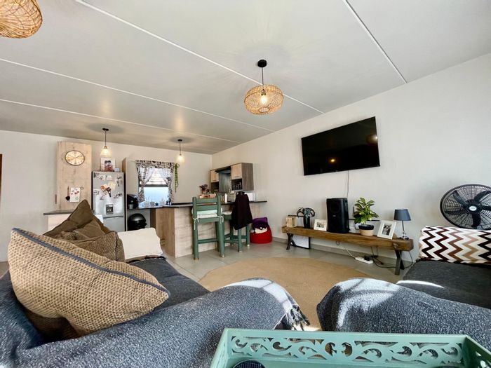 Townhouse For Sale in Potchefstroom Central: Secure complex, private garden, investment opportunity.