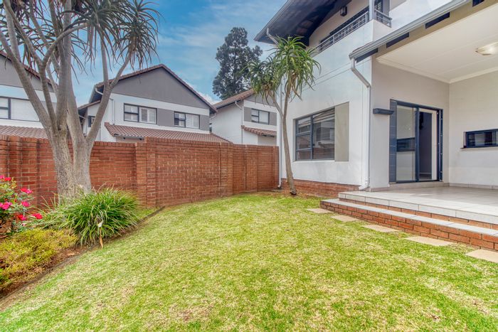 For Sale: Paulshof Townhouse with private garden, double garage, and energy-efficient features.