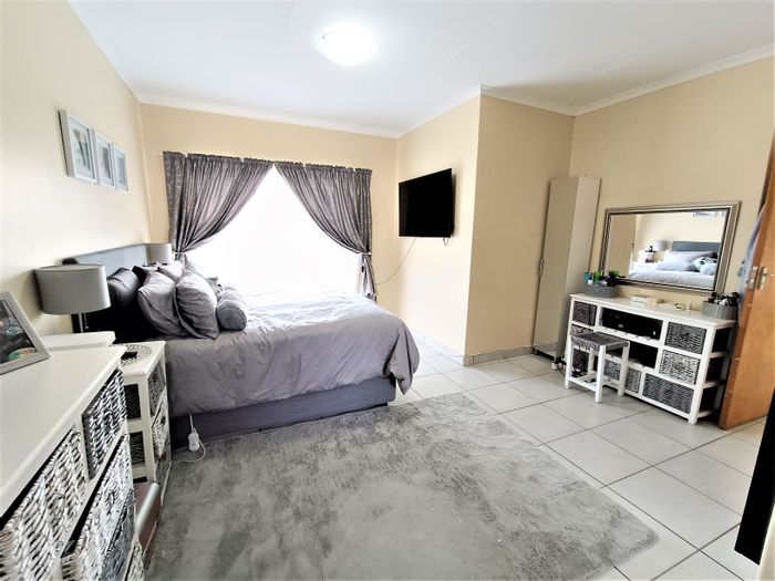 For Sale: 3-Bedroom Townhouse in Zwartkop with private garden and secure parking.