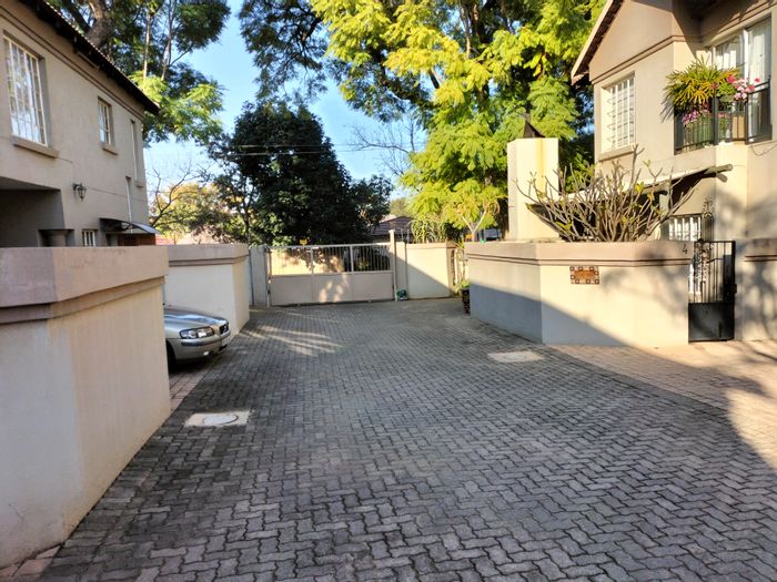 3-Bedroom Townhouse For Sale in Pretoria North with garden, pet-friendly, and secure fencing.