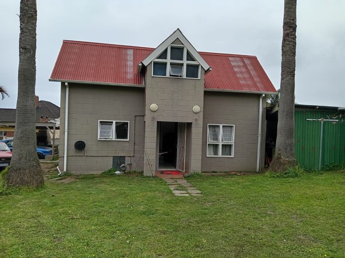 Charming Cambridge West house with flat, yard, and ample parking for sale.