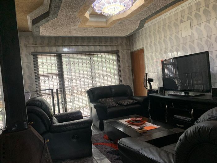 3-Bedroom Townhouse for Sale in Vanderbijlpark CW 3 with ample parking and outdoor space.