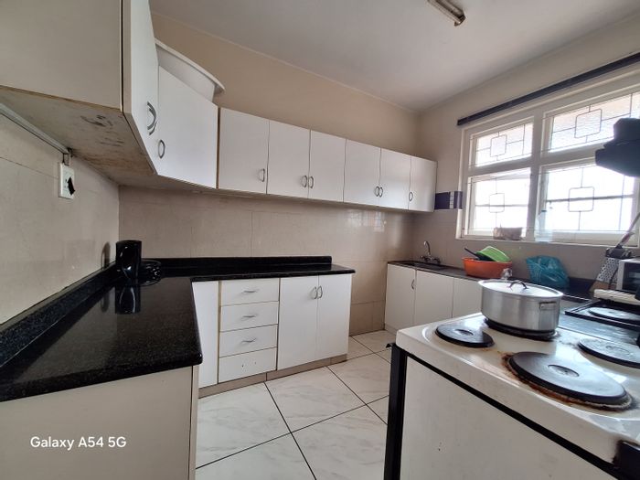 1.5-Bedroom Flat For Sale in Glenwood, near Davenport Centre, with garage included.