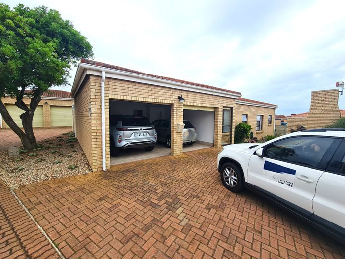 For Sale: Townhouse in Jeffreys Bay Central with 3 bedrooms, double garage, and courtyard.