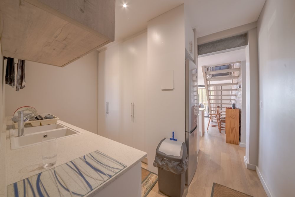 Scullery and small hallway to kitchen and living area