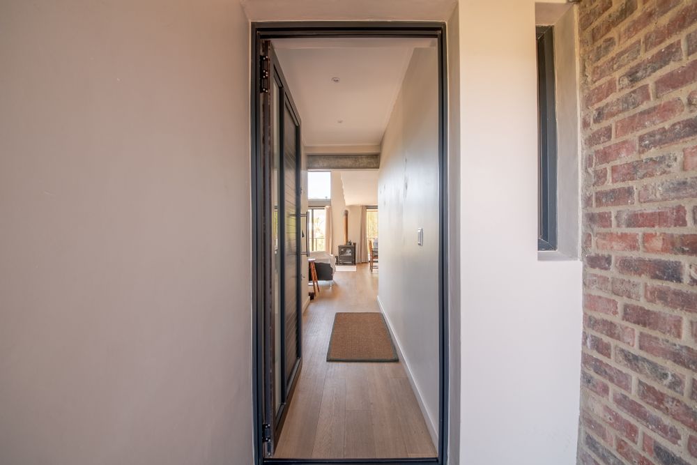 Property entrance, from wind lobby to main house