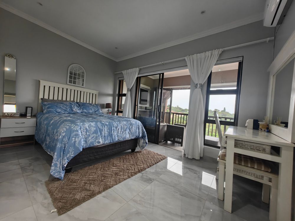 Main bedroom opening-up onto enclosed patio