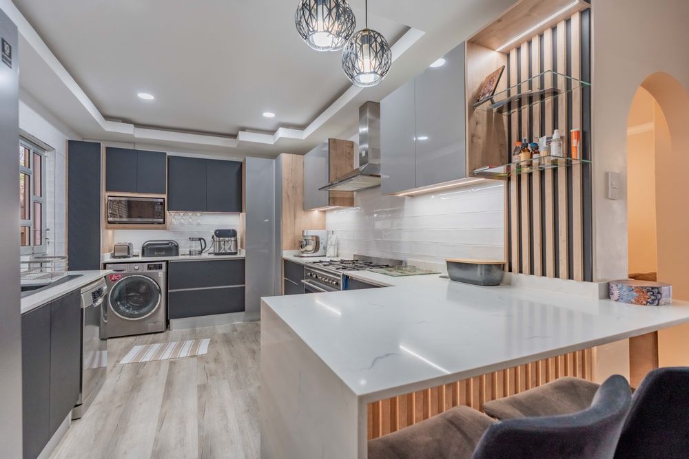 Gorgeous Quartz kitchen and waterfall countertops