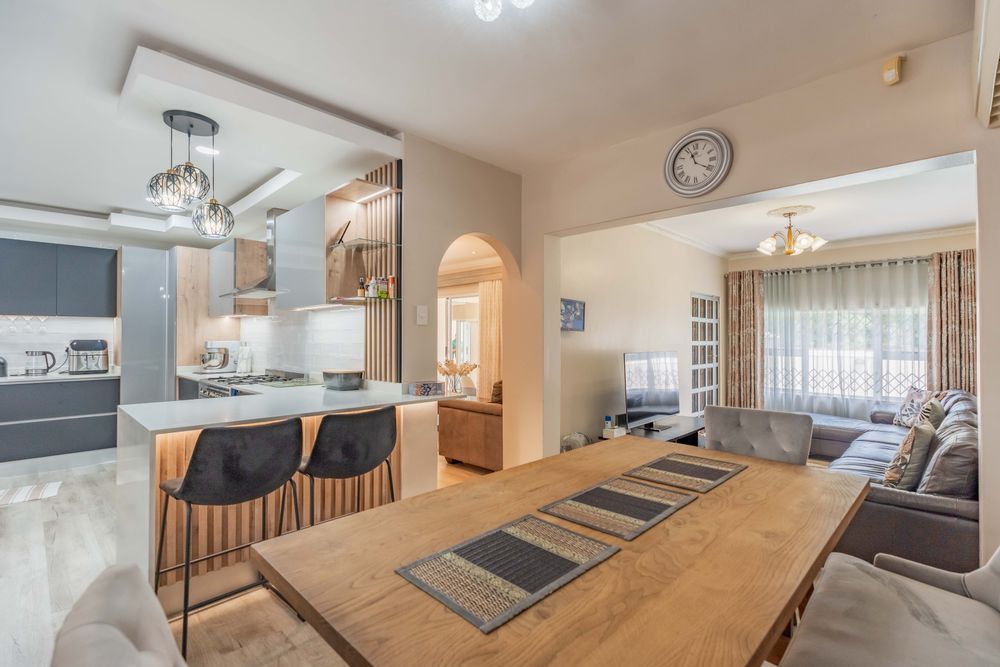 Dining room open plan onto kitchen and tv lounge