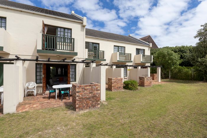 Townhouse For Sale in West Beach: Open-plan living, outdoor braai, investment potential.