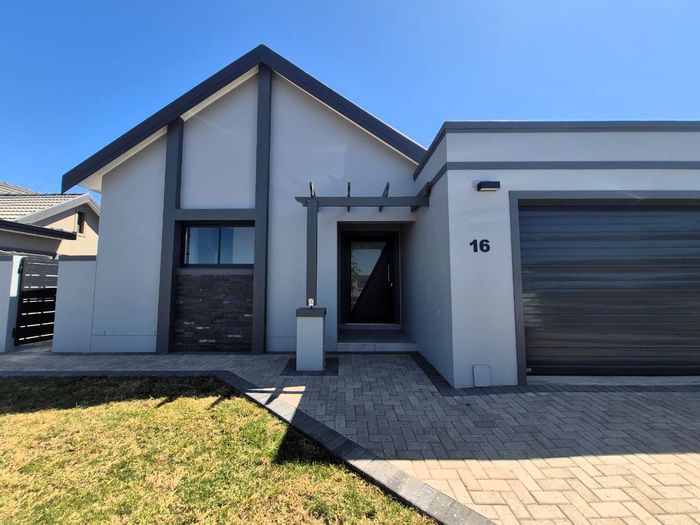 For Sale: 3-bedroom house in Altona with open-plan living, double garage, and secure estate.