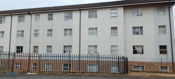 2-Bedroom Apartment For Sale in Riverside View with open-plan living and parking.