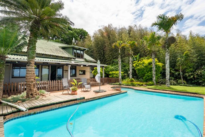 Amanzimtoti Townhouse For Sale: Pool, garden, office space, and secure complex living.