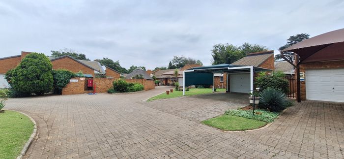 Townhouse for Sale in Vanderbijlpark Central: 2 beds, pool, secure complex, private garden.