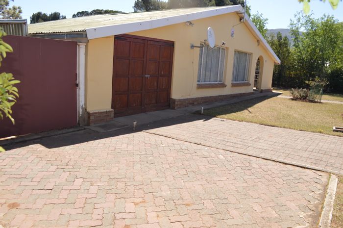 Dual-family living or investment opportunity in Westhof: 2 homes, proven rental income. For Sale.