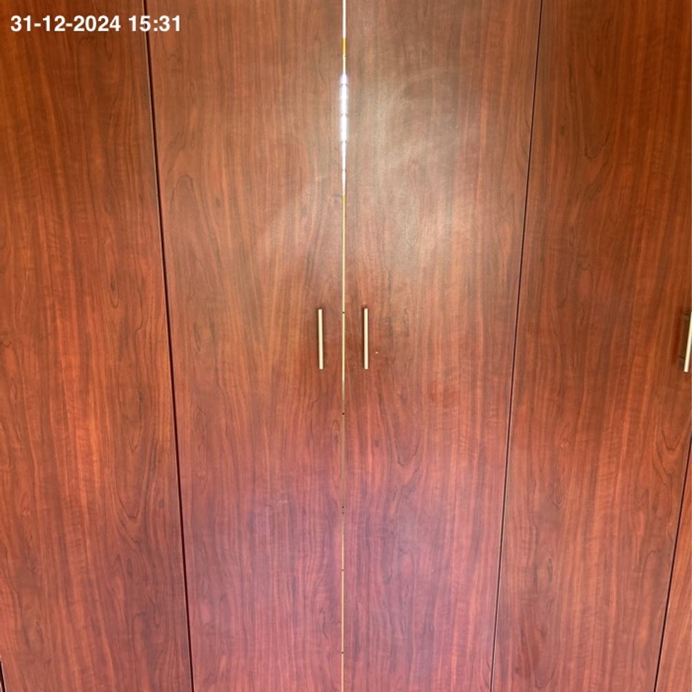 built in cupboards to back house