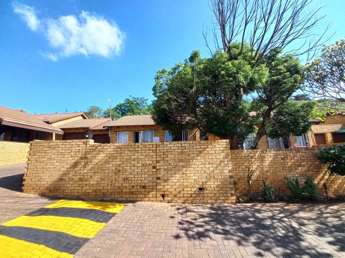 For Sale: Townhouse in Safari Gardens with study, braai area, and communal pools.