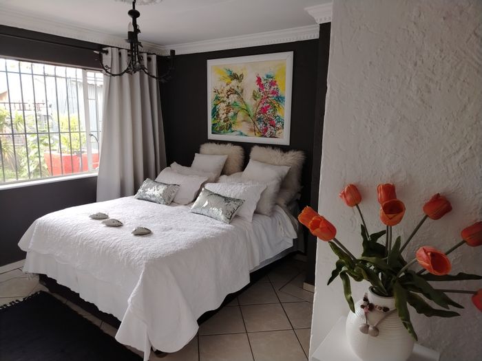 2 Bedroom Cluster To Rent in Brakpan North with garden and secure parking.