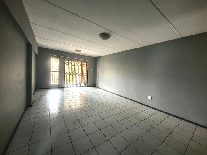 For Sale: Spacious 3-Bedroom Apartment in Safari Gardens with Private Patio and Parking.