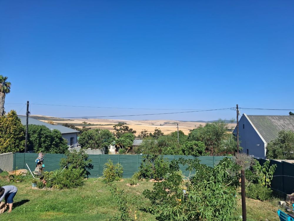 The overhead wires are actually at the behind the plot