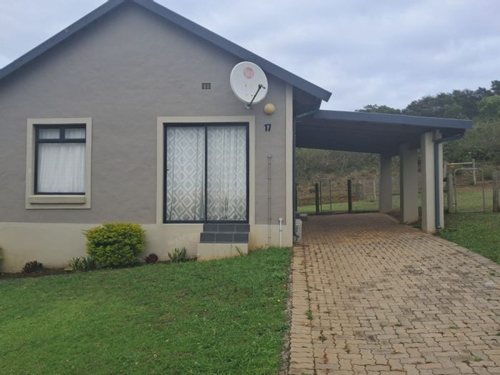 For Sale: 2-bedroom house in Kidds Beach with garden, security, and parking.